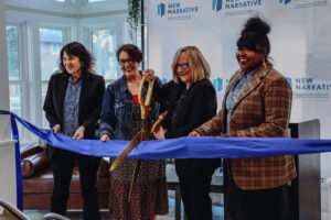 Commissioner Meieran, Chair Vega Pederson, CEO Julie Ibrahim, and OHA Behavioral Health Director Clarke prepare to cut the ribbon in the community room