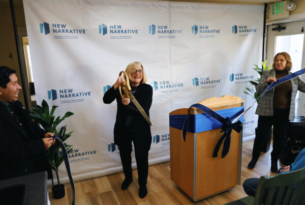 Julie cuts the ribbon