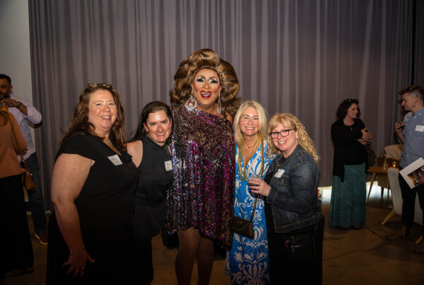Poison Waters poses with gala attendees