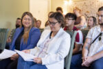 Chair Vega Pederson and Rep. Nguyen smile in the crowd